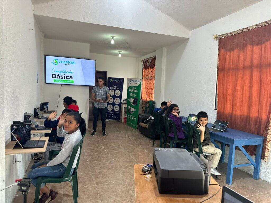 Ten elementary-school children attending a computer camp in the Chaptops computer lab in Tactic, Alta Verapaz, Guatemala.