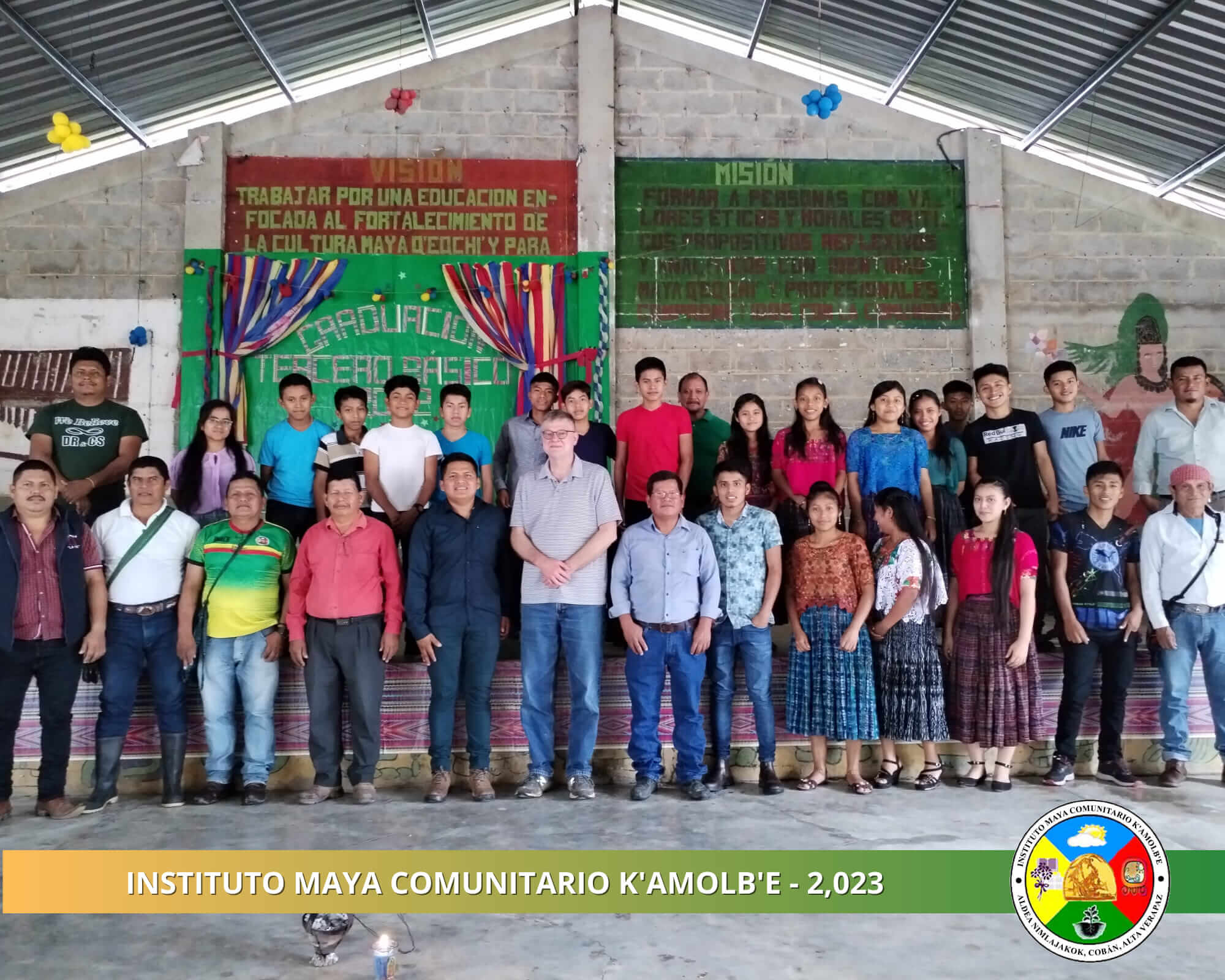 Student assembly at Instituto Maya Comunitario K’amolb’e in Alta Verapaz, Guatemala, including student body, faculty, officers of corporation, cofounder Fredy Oxom, and Chaptops Executive Director Rex Dwyer.