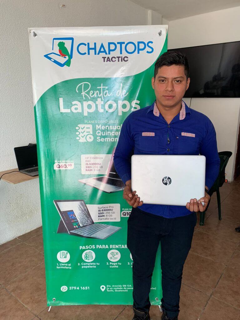 A teacher who has rented a computer from Chaptops in Tactic, Guatemala.