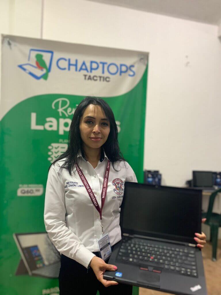 A teacher who has rented a computer from Chaptops in Tactic, Guatemala.